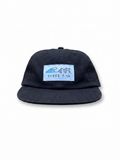 black cap with a blue logo on a white background