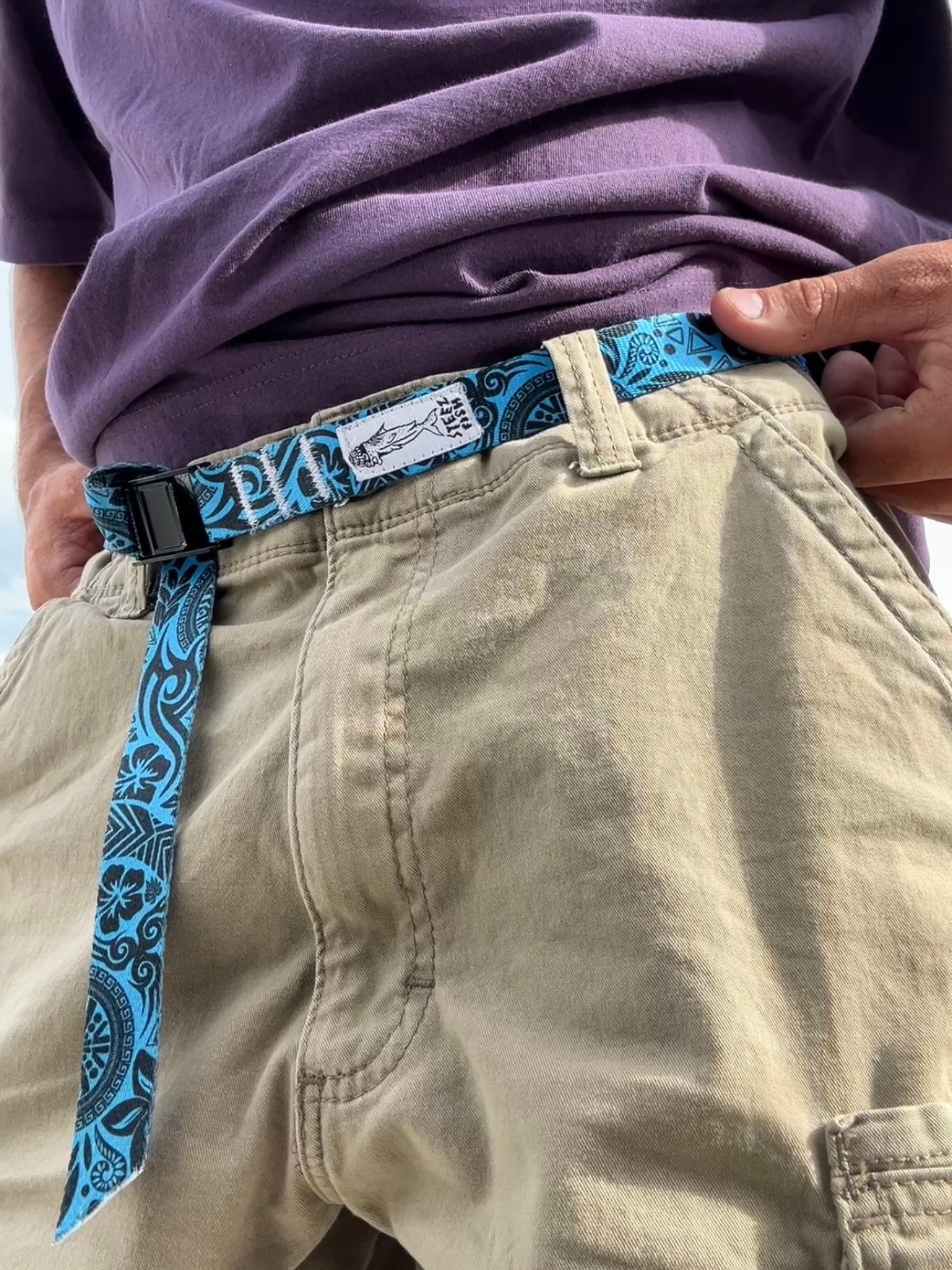 blue polynesian cam-strap belt