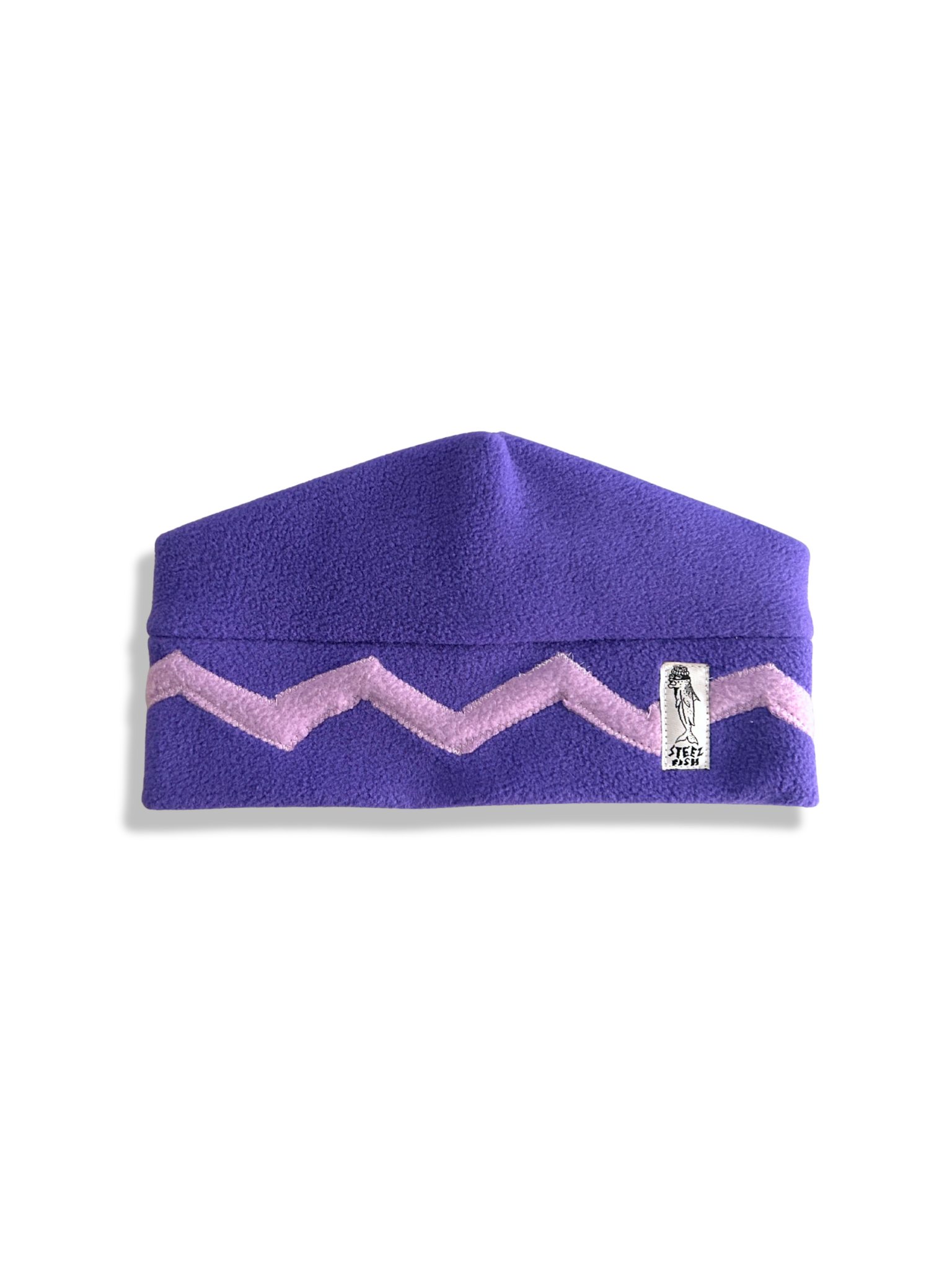 Purple fleece beanie with pink zigzag pattern on a white background