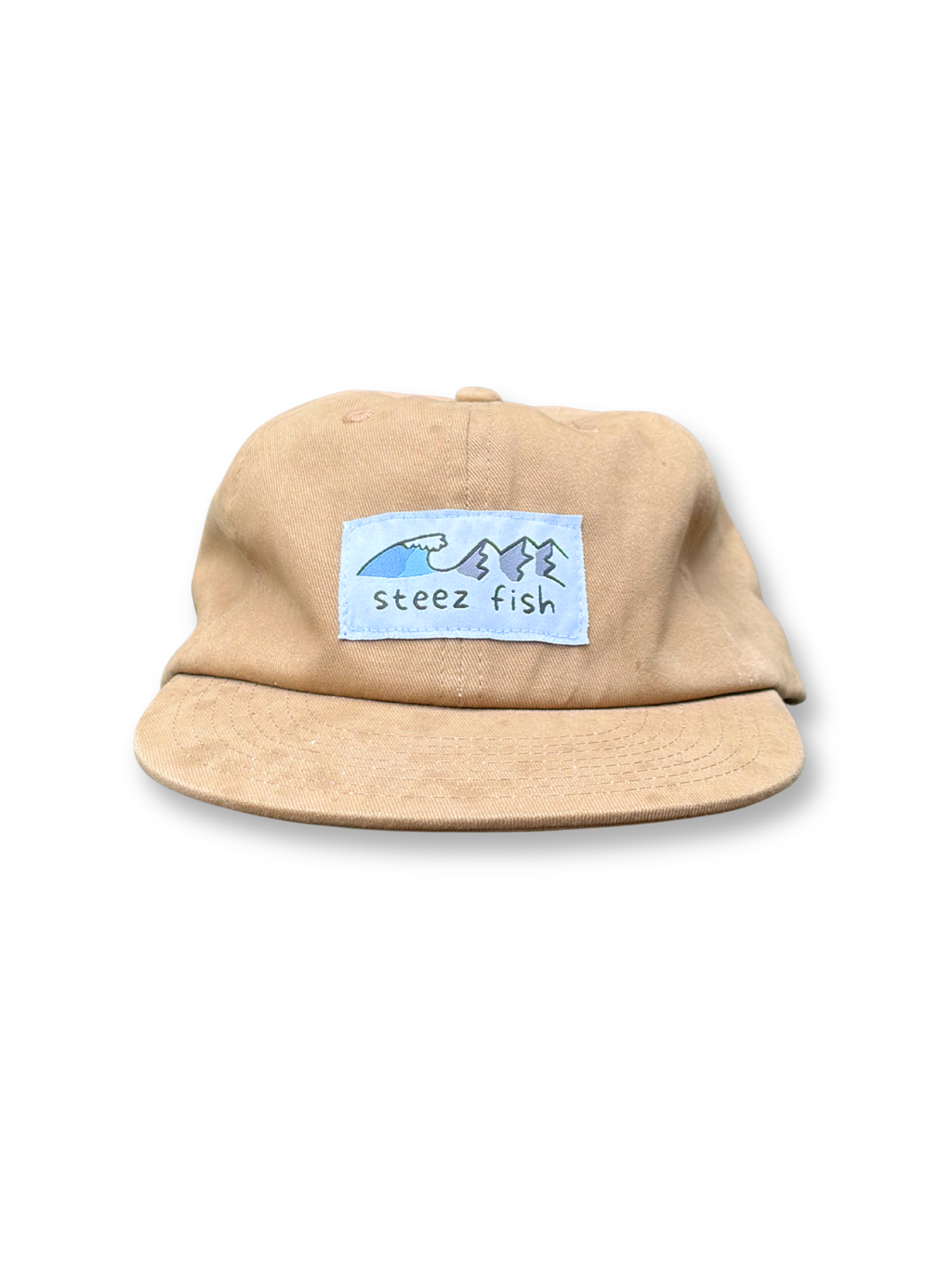 beige cotton hat with mountain-wave woven patch